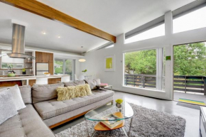 Quiet Mid Century Modern Retreat with Patio and Yard by Lodgewell